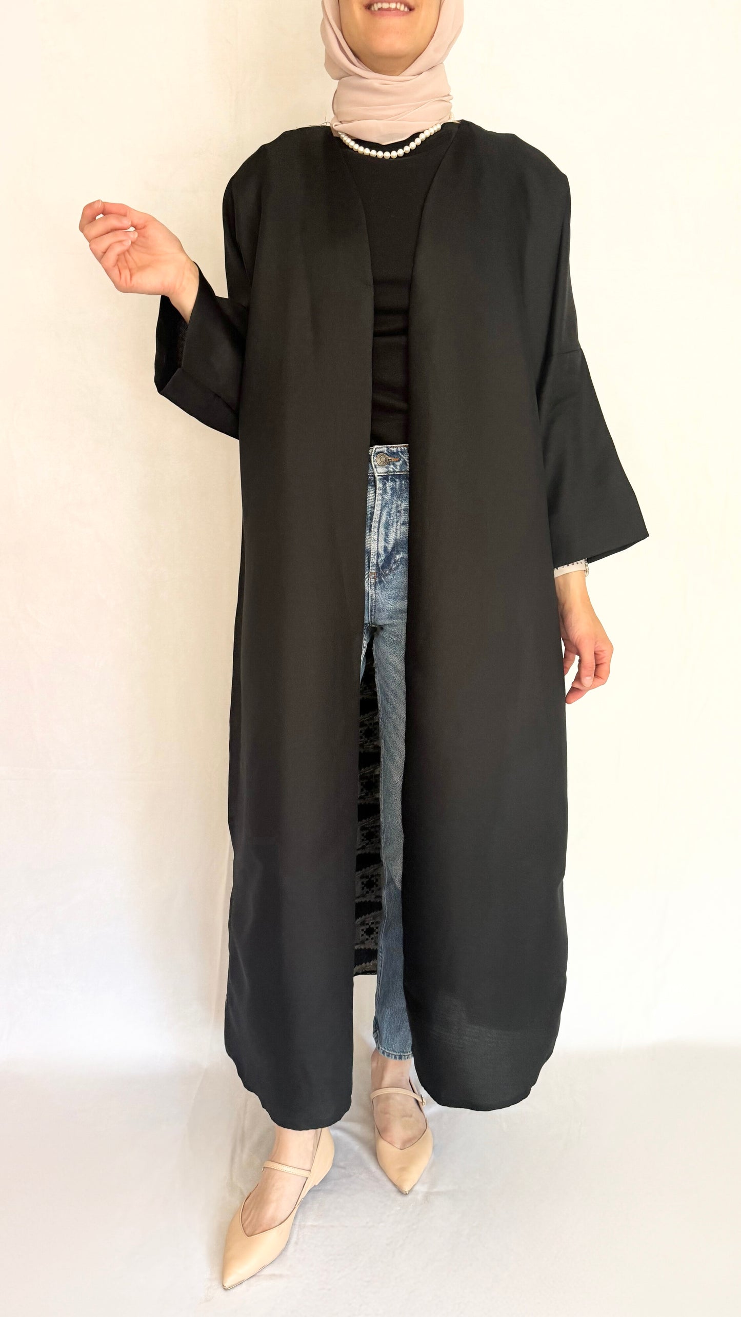 Open Black Abaya made from premium viscose material.
