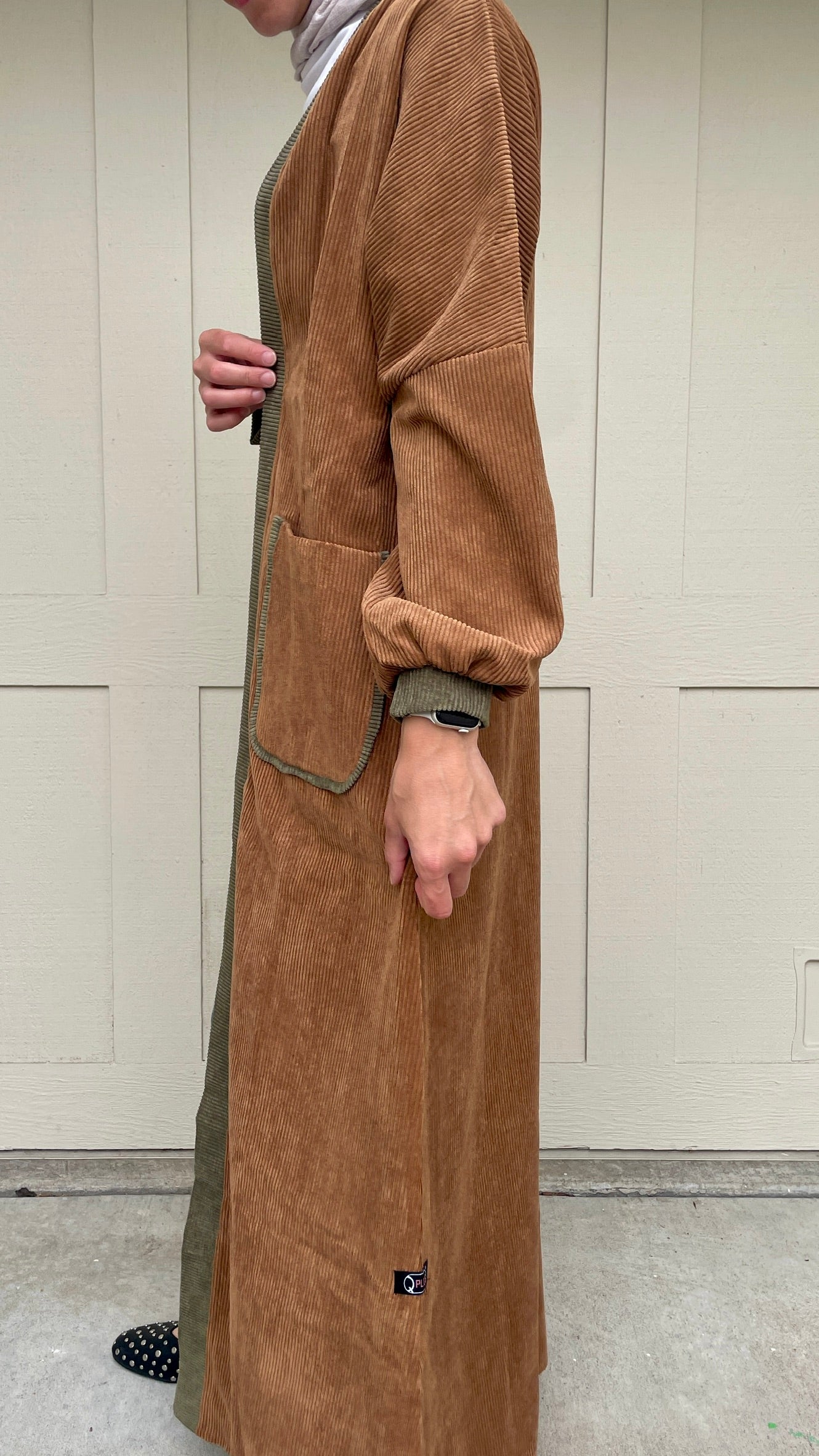 closeup view for the cardigan in classic camel color