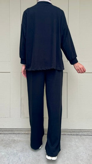 back view of the two pieces ribbed set in black