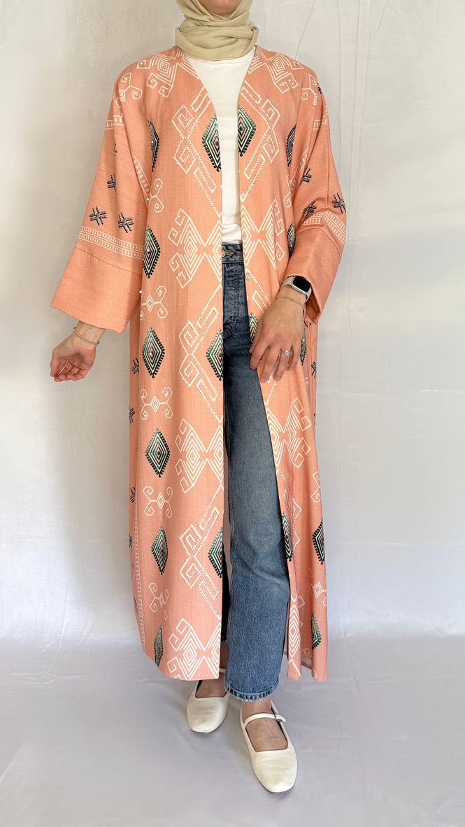 abaya matched with jeans for a casual ramadan look