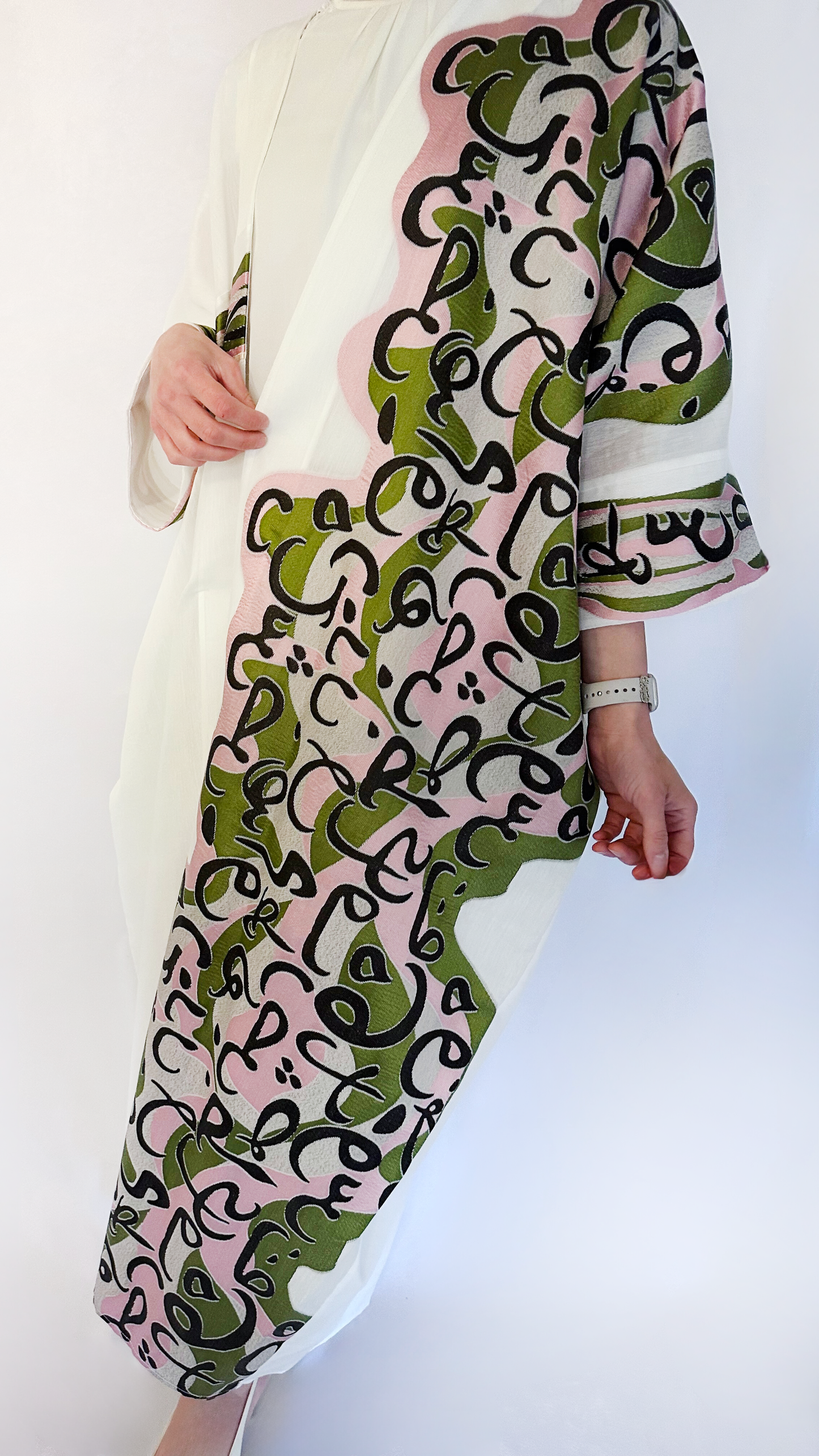 luxurious oversized offwhite bisht with arabic calligraphy in pink