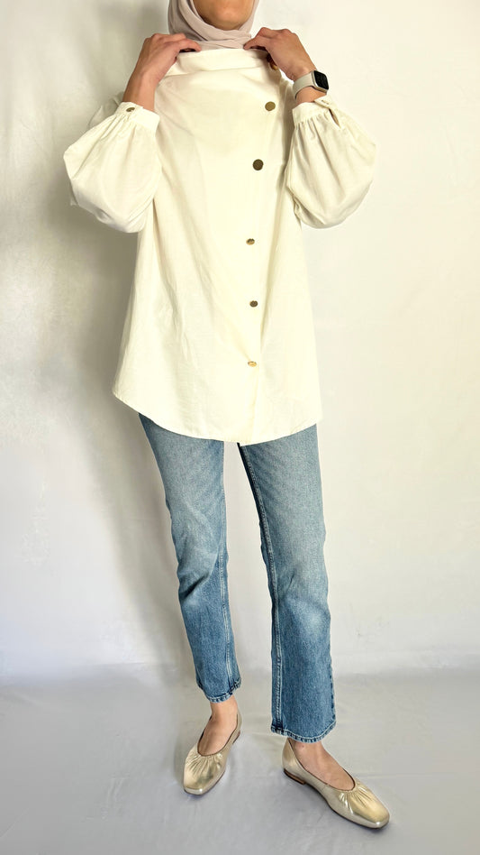 verstile long sleeve ivory shirt that is a wardrobe staple this season  