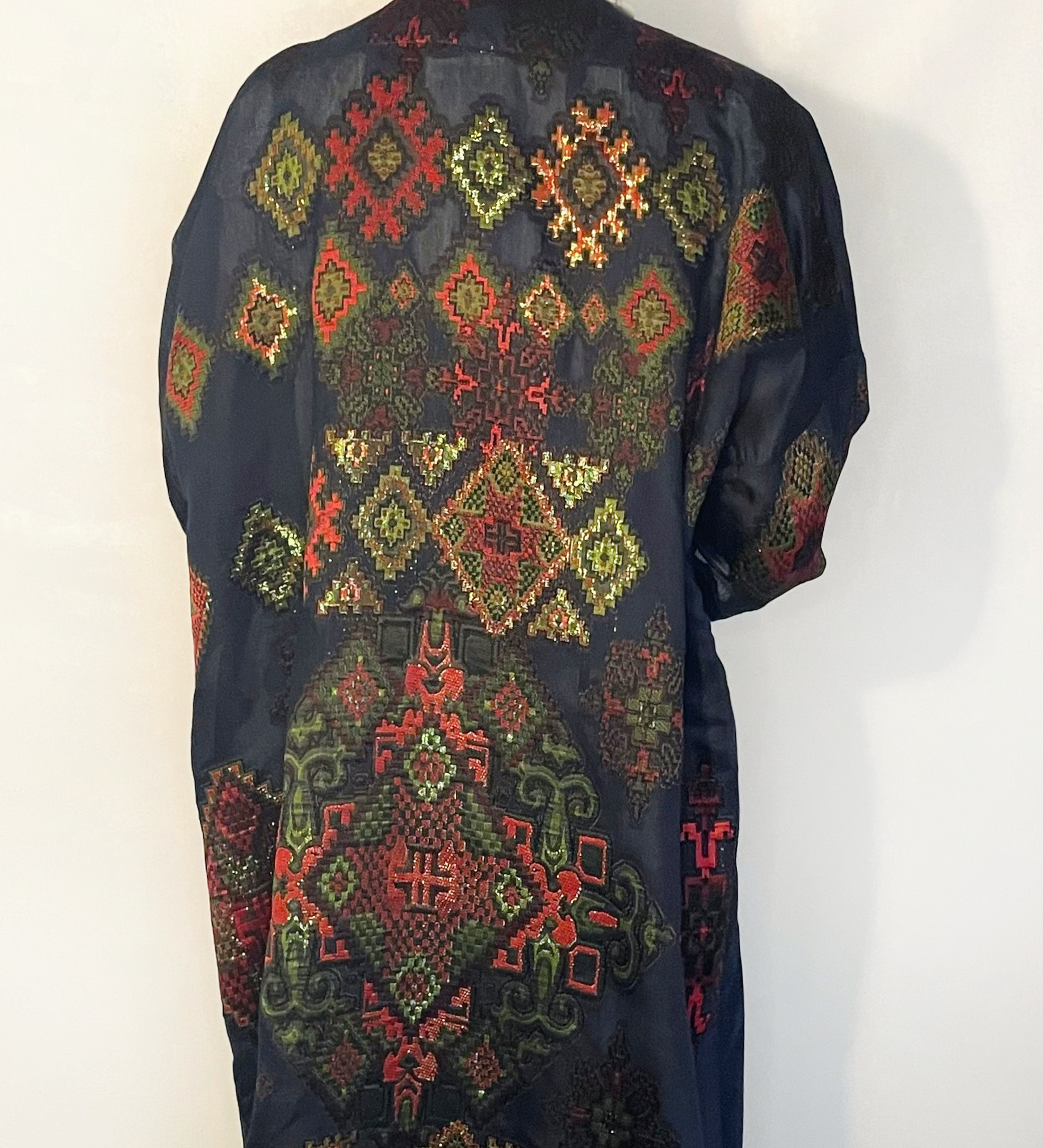 tunning Navy Long Kimono featuring a vibrant and eye-catching colorful pattern in red